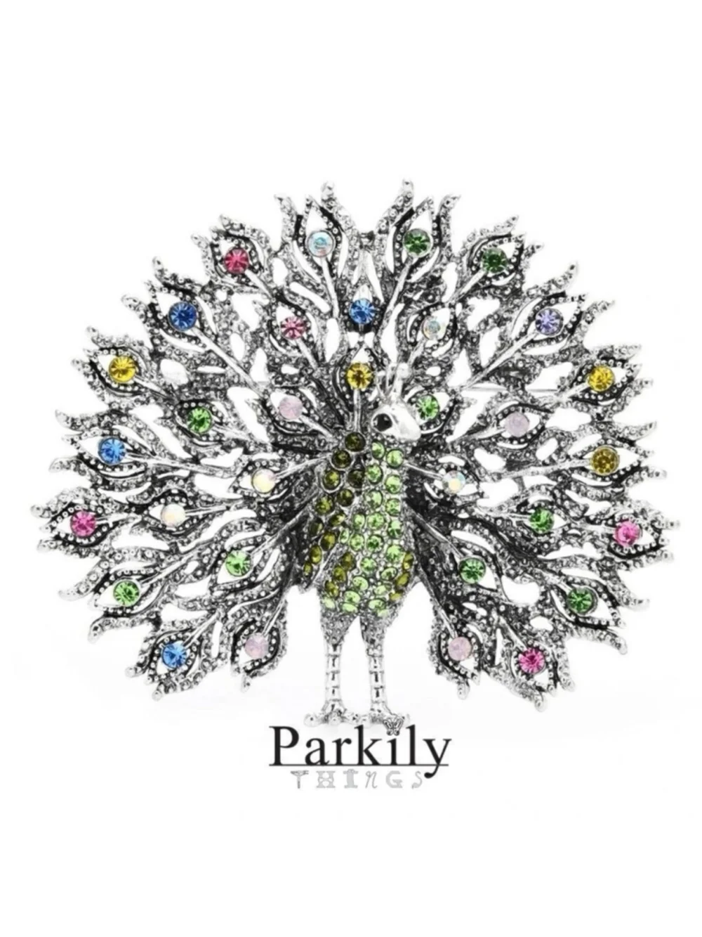 Brooch peacock in sparkly green and multicolor crystals in a silver pin setting